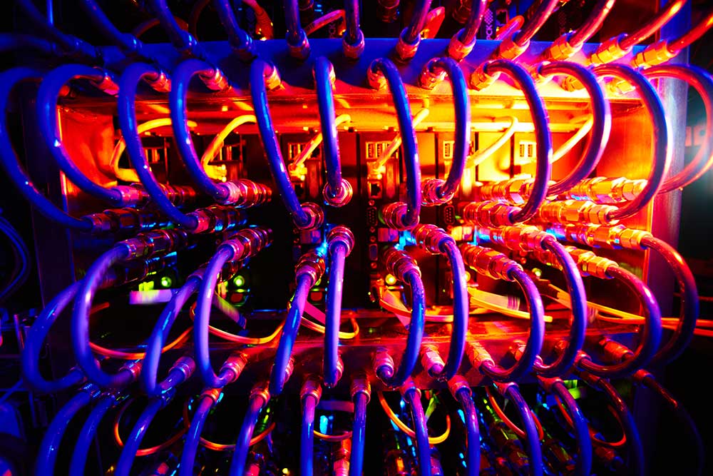 Supercomputer with rows of fibre optic neon cables